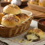 Basket of Garlic Parmesan Cheeseburger Bombs with dipping sauce